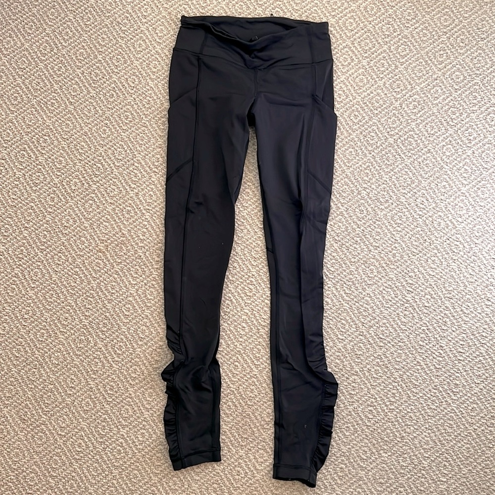 Lululemon running leggings black, ruched at bottom, size 4